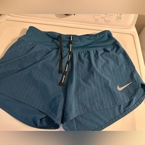 Blue Nike shorts size medium. Excellent condition!